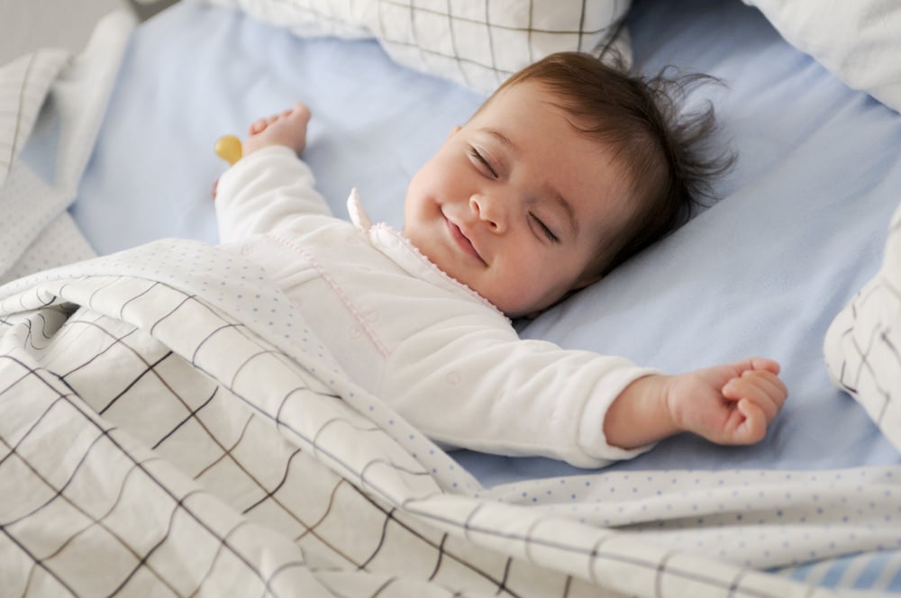 Ortu Tak Perlu Cemas, Ini Penjelasan Ilmiah Kenapa Bayi Senyum Saat Tidur
