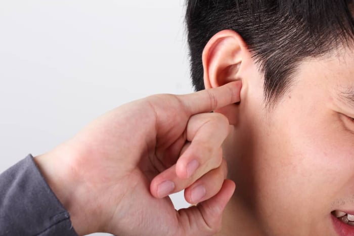 mengatasi telinga tersumbat
