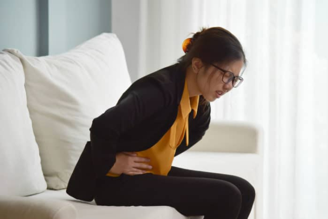 5 Penyebab Perut Terasa Kencang dan Sakit Pinggang